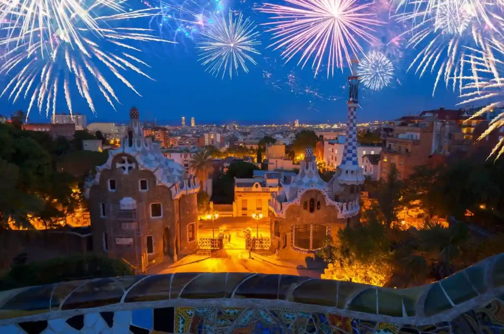 park guell at night with fireworks in barcelona, spain photo